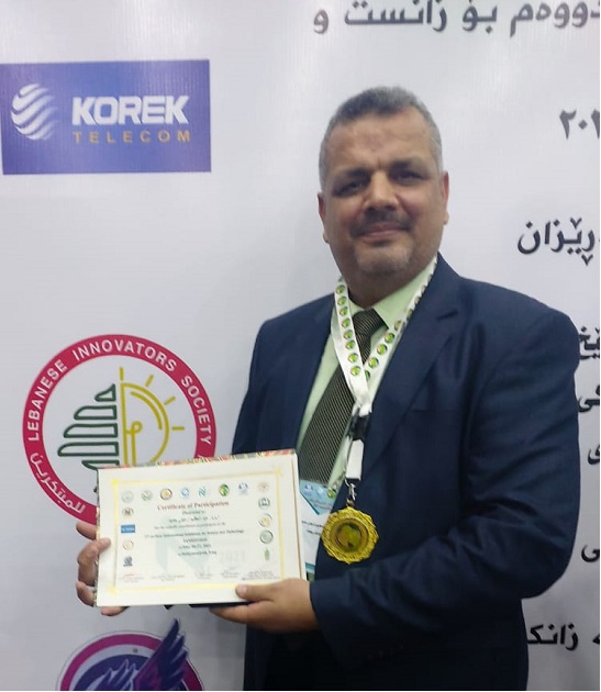تدريسي في كليتنا يحصل على الوسام الذهبي في احدى المؤتمرات الدولية